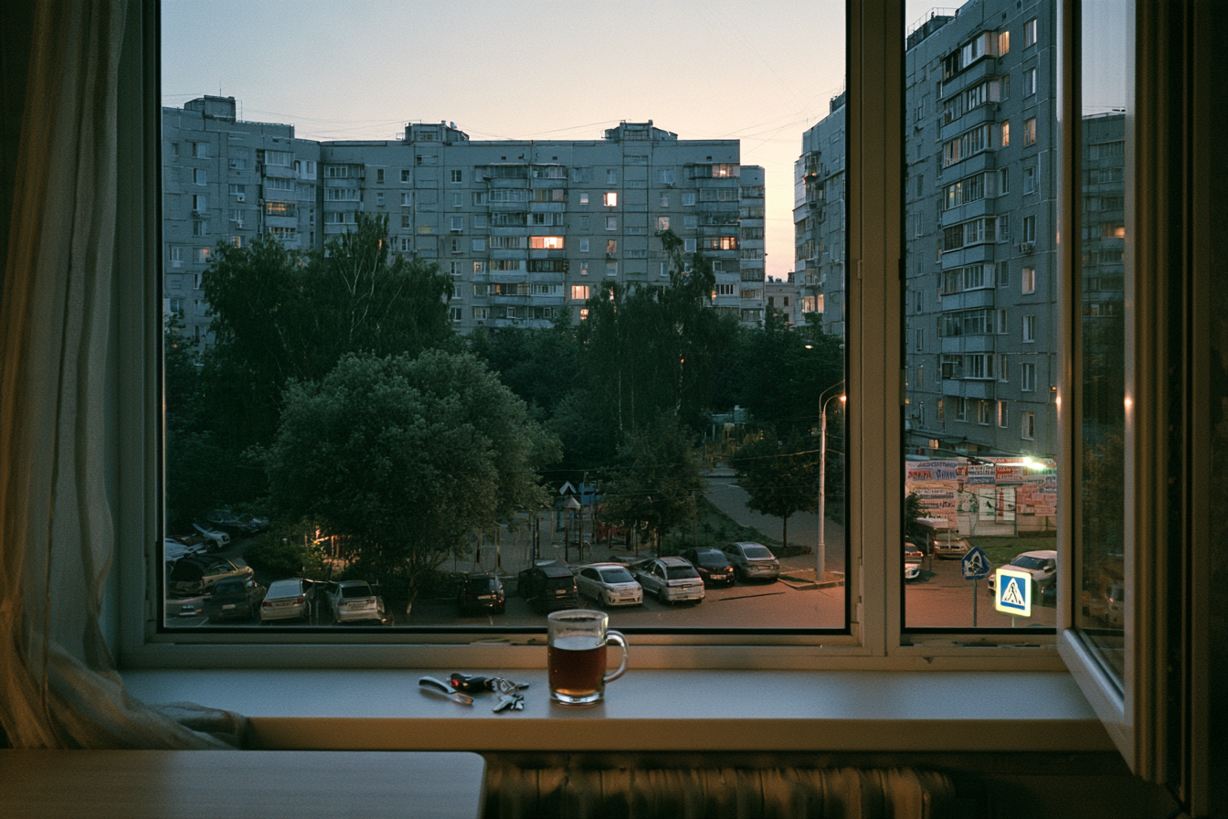An apartment window in early morning light
